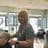 Smiling woman, Edna Kemp Advanced Stylist at The Classic Hair Company in Tilbury, Essex.