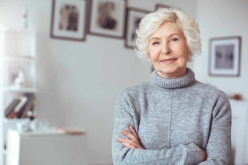 Mature woman with short soft styled hair after professional blow dry